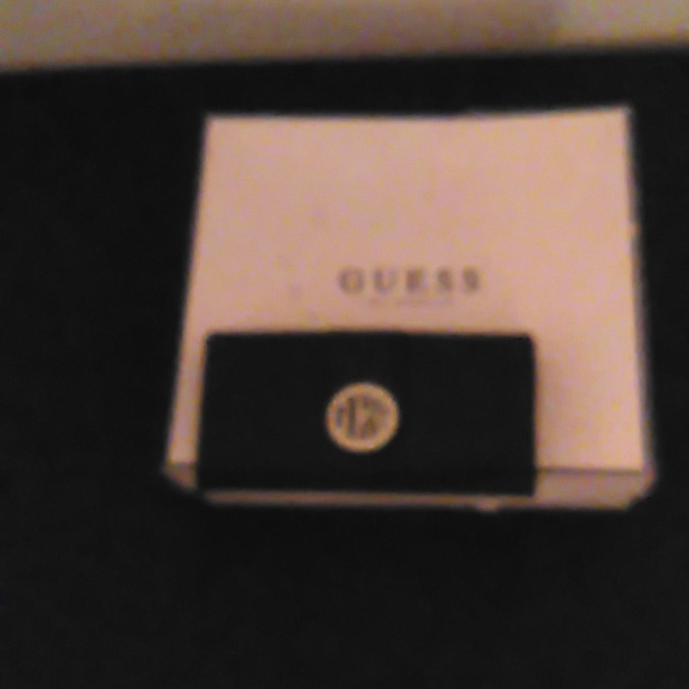 A black Guess Wallet